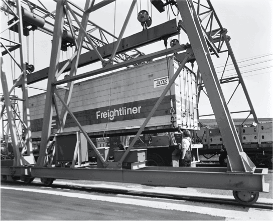 Photograph of a Freighliner container being moved